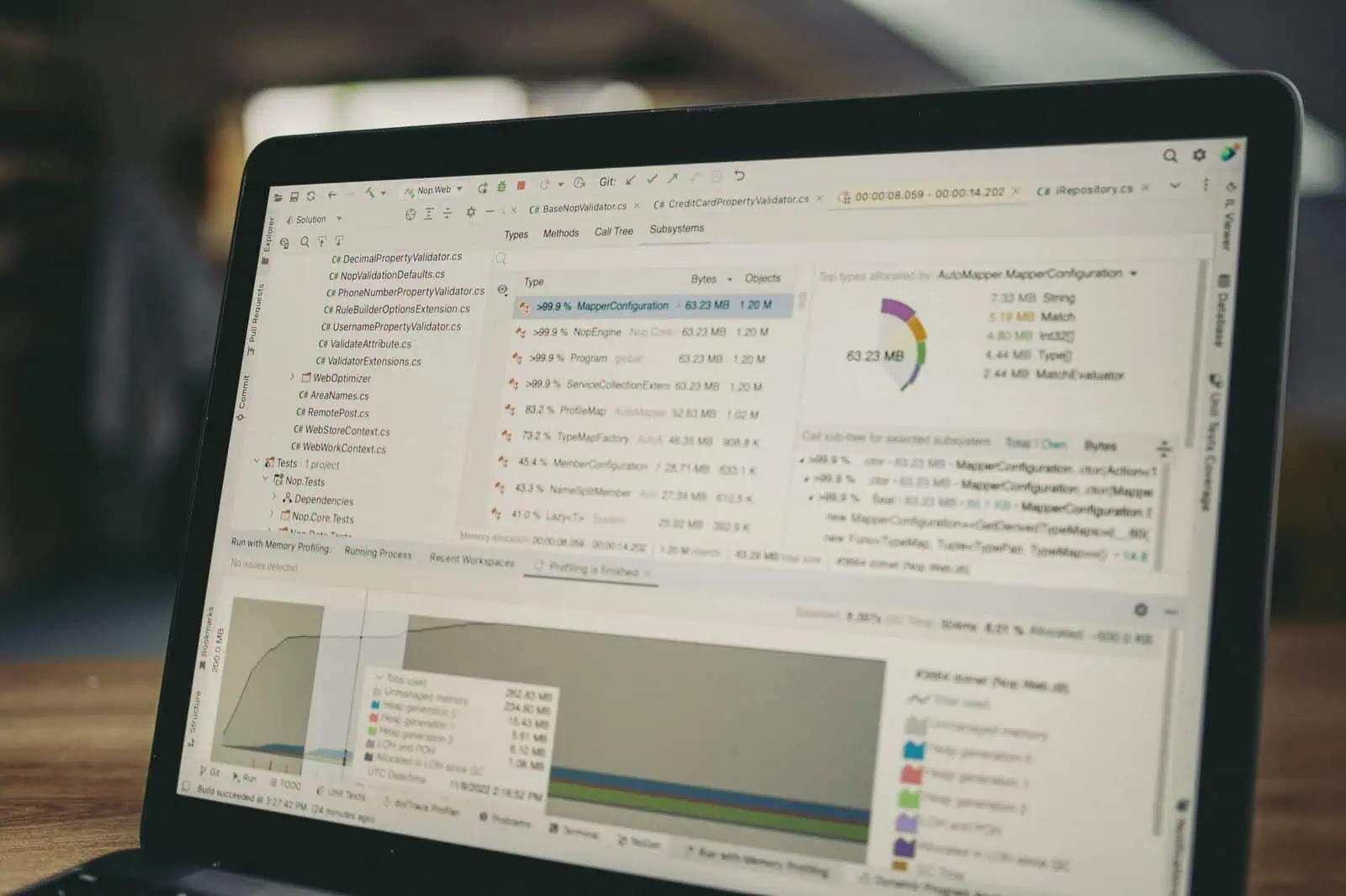 Laptop showing code and a data analysis interface, the kind of view used in a technical SEO review