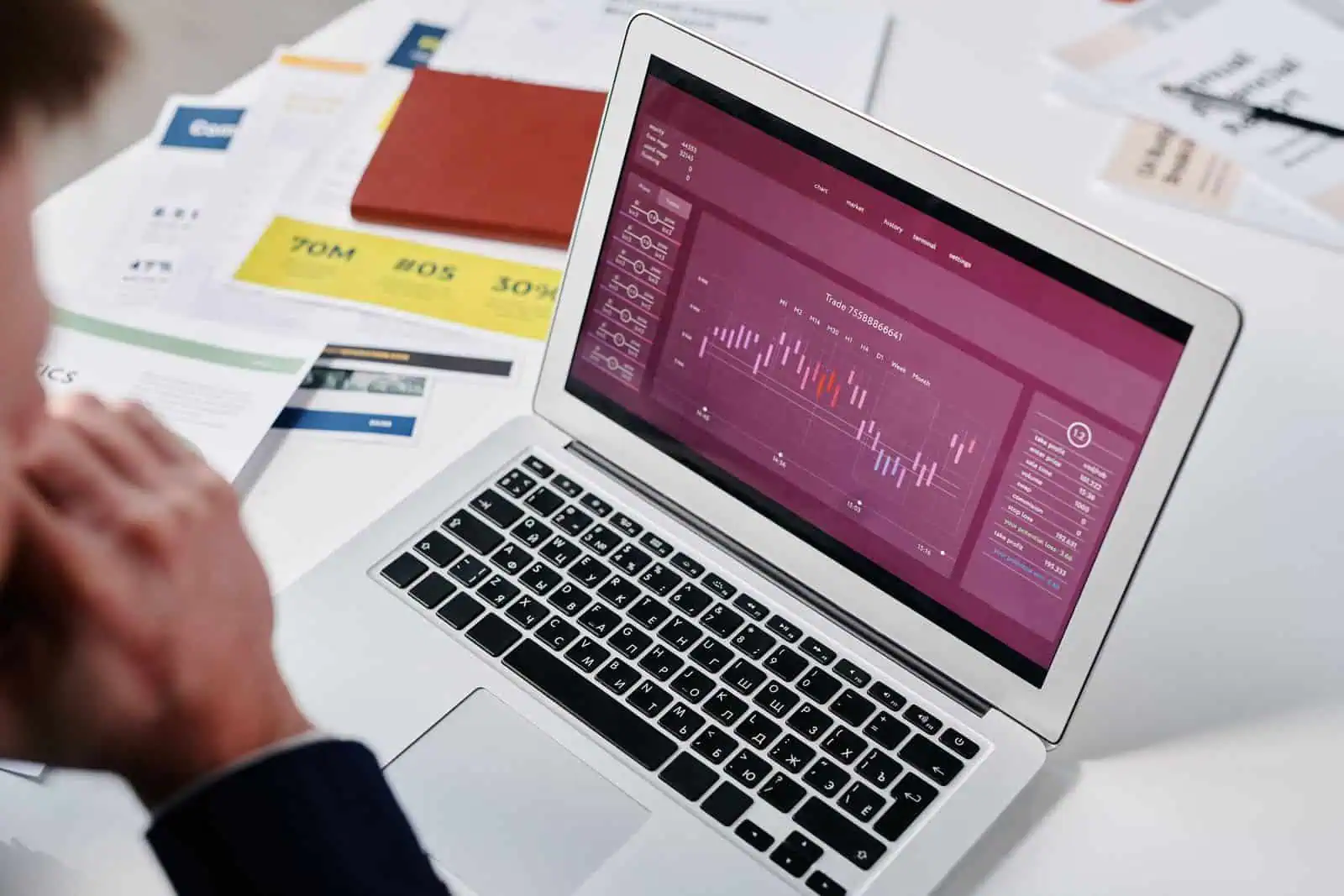 Purple growth chart on a computer screen, representing SEO results measured from rankings to revenue